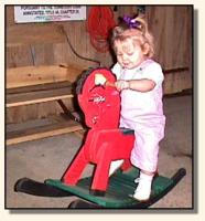 Shelby riding her horse! (9290 bytes)